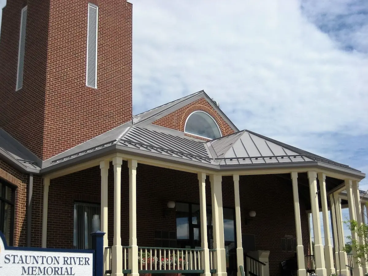 Skilled roofing craftsmen working on a residential roof in Nisky